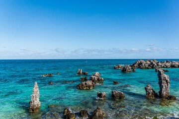 Tobacco Bay's Coastal Charm: St. George's, Bermuda; where sturdy rocks frame azure waters, a...