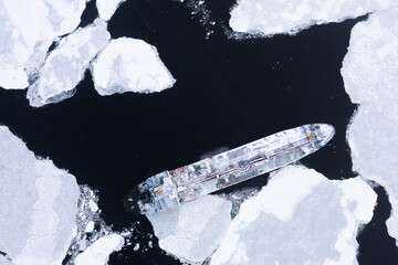 The sea vessel is among the ice.