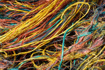 Fishing net on a fishing vessel deck. Close-up shot.