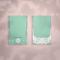 Business card in mint color with greek white pattern for your business.