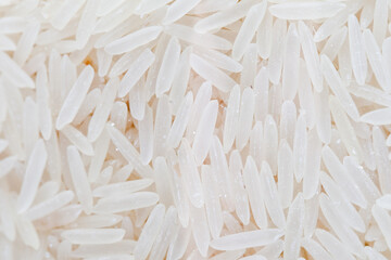 Basmati rice in a transparent macro jar. Useful cereal, oriental cuisine, recipes, healthy food