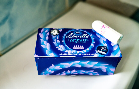 Norwich, Norfolk, UK &ndash; November 05 2021. Close up and close selective of a box of Boots branded tampons on a white toilet cistern