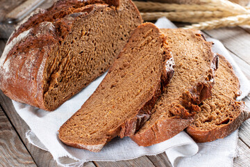 Freshly baked rye bread, close up photo. Homemade sourdough bread.