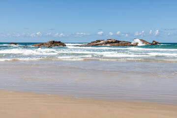 Rocks, Waves and sand on the beach