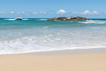 Rocks, Waves and sand on the beach
