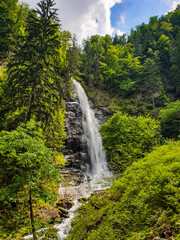 waterfall in the forest, Scorusilor Waterfall, Capatanii Mountains, Romania 