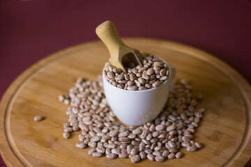 Beans on a wooden background.