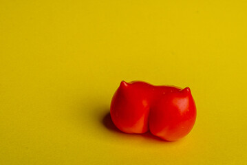 the tomato was born of an unusual shape. High quality photo