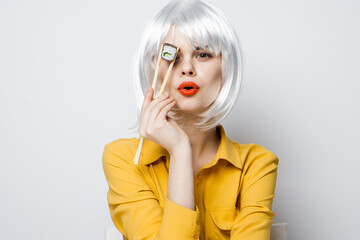cheerful woman in white wig japanese food glamor