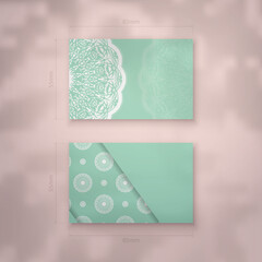 Mint color business card with luxurious white pattern for your business.