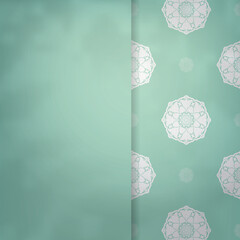 Mint color flyer with Indian white ornaments for your design.