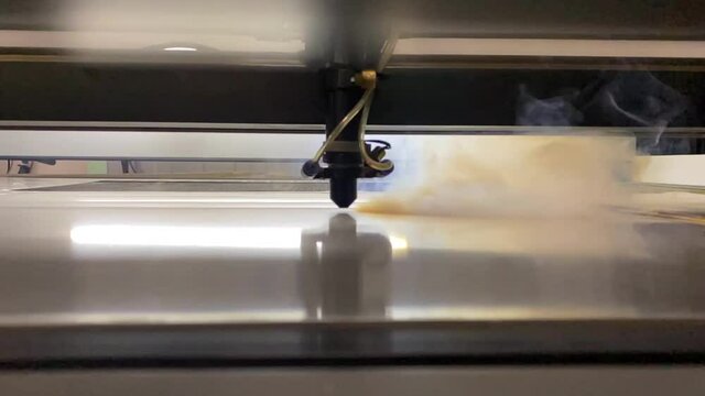 The laser machine cuts plexiglass into parts.When cutting, a poisonous acrid smoke of white color is released. Harmful production.