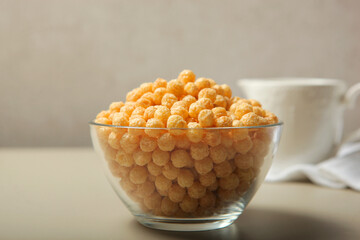 corn balls in glaze for breakfast close-up on the table
