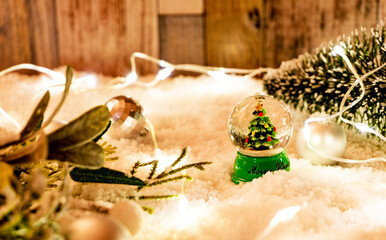 Snow globe and illuminations on the snow. 雪上のスノードームとイルミネーション