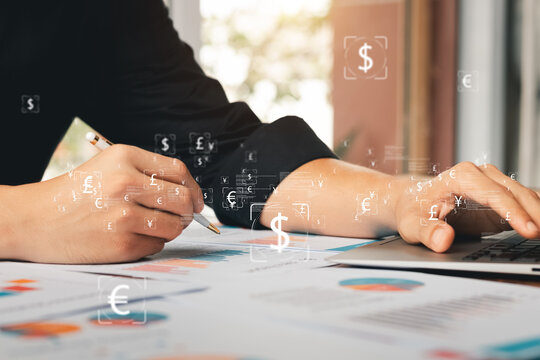 Businessman analysis business report graph and finance chart at Coffee Shop, conceptual of finance economy, stock market research, and banking business.