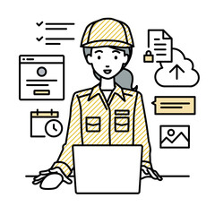 デスクで座ってPCでプロジェクトやタスクの管理の仕事をしている作業員の女性