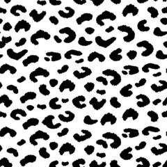 Abstract modern leopard seamless pattern. Animals trendy background. Black and white decorative vector illustration for print, card, postcard, fabric, textile. Modern ornament of stylized skin