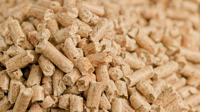 looped close-up rotation of compacted wooden sawdust pellets