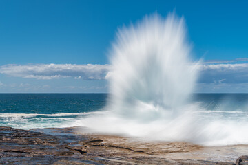 Wave Exploding On Rock Shelf