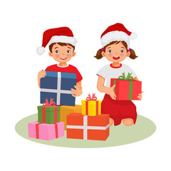 Cute kids in red Santa hat sitting with gift boxes and holding Christmas presents. Little boy and girl, brother and sister feeling happy celebrating new year holiday.