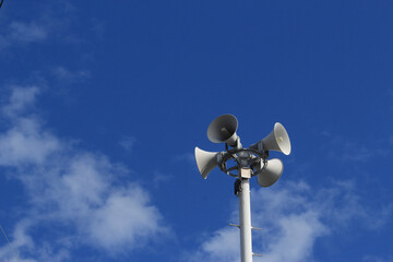 loudspeaker on blue sky