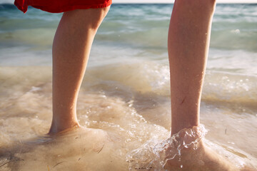 female feet ocean shore sand summer travel