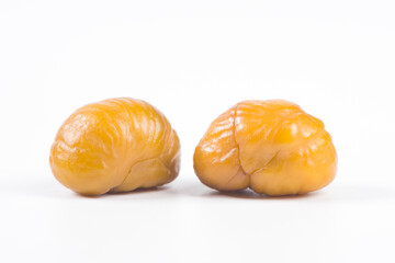 Close-up Chestnuts with peeled  isolated on white background.