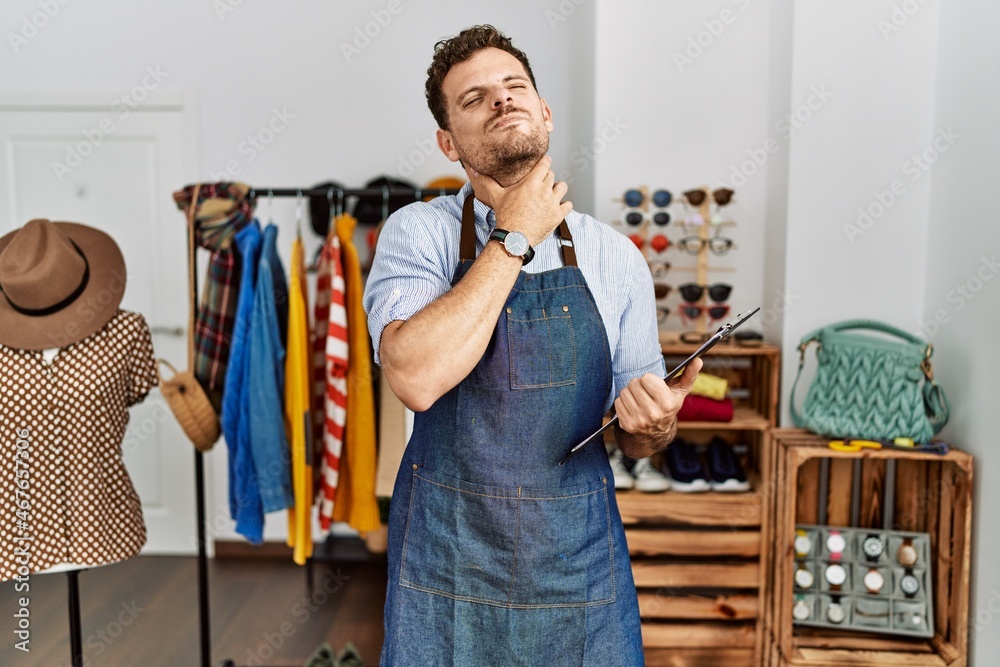 Sticker handsome young man working as manager at retail boutique touching painful neck, sore throat for flu,