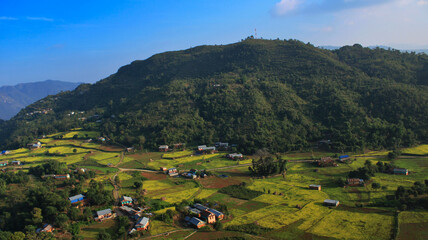 landscape of village with a mountain. 