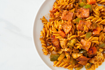 fusilli pasta with ham and tomatoes sauce