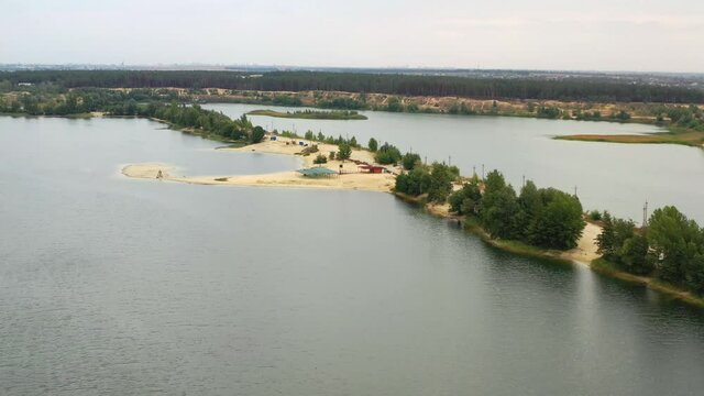 Bezludovka. Sand quarry. Reservoir. Aerial photography 4K.