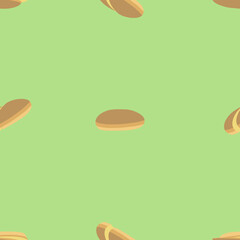 A seamless jpeg pattern of round buns isolated on green background. Designed in beige, brown colors for prints, templates, backgrounds, wraps
