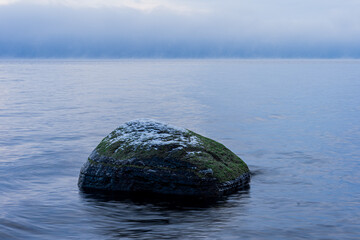 Stone in Lake Mjøsa at winter.
