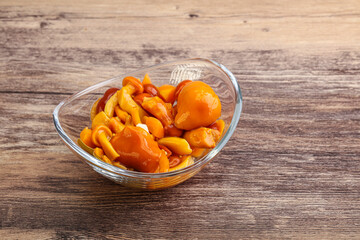 Marinated pickled honey mushrooms in the bowl