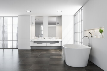Naklejka na ściany i meble Bright bathroom interior with white bathtub, double sink, two mirrors