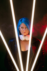 Cyber girl. Futuristic style. Generation Z. Cyberpunk brave confident woman with headphones in LED...