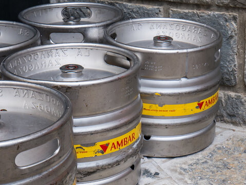 Beer barrels made of steel (beer brand Ambar-La Zaragozana) outside of a pub in Panticosa, Aragon, Spain
