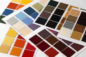 texture palette of fabric samples for selection, home design, textile material on white background close up