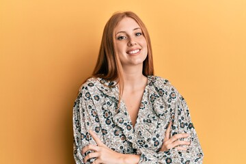 Young irish woman wearing casual clothes happy face smiling with crossed arms looking at the camera. positive person.