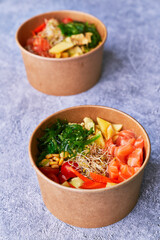  Delicious take away poke bowls on a concrete surface