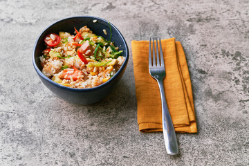  Delicious poke bowl on a concrete surface