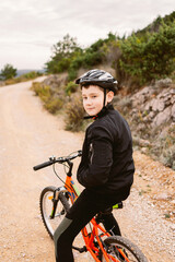 Boy on a bicycle in nature