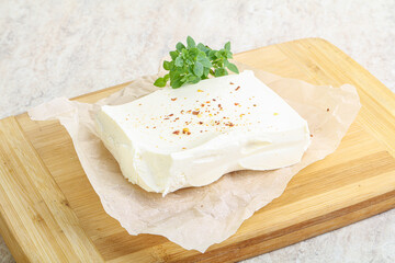 Greek Feta cheese over board