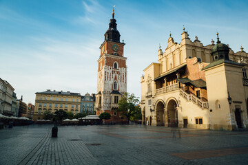 Naklejka na ściany i meble Long exposure panorama of the ancient Town Hall Tower, located on Karkow's main square, Poland.