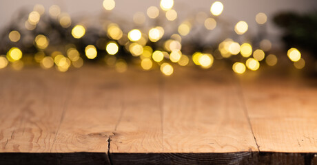 empty wooden table top with blurred light gold bokeh abstract background. For montage product...
