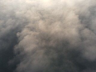 aerial view of fog above sea