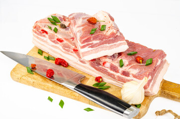 Piece of raw pork belly, fresh meat for cooking. Studio Photo