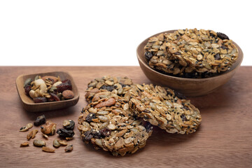 Cereal Cookies homemade with fruit and nuts. Healthy food, Whole grain cookies, on wooden background. Selective focus.