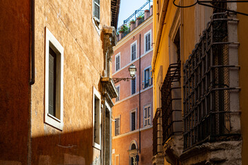 Fototapeta na wymiar Narrow street in the center of Rome, Italy