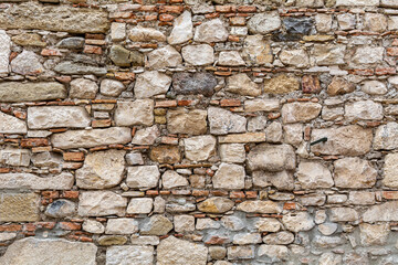 Old stone wall. Aged surface texture. Stone Background